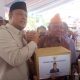 HUT ke-24 Kepri di Meral, Ketua DPRD Iman Sutiawan Salurkan 300 Paket Sembako